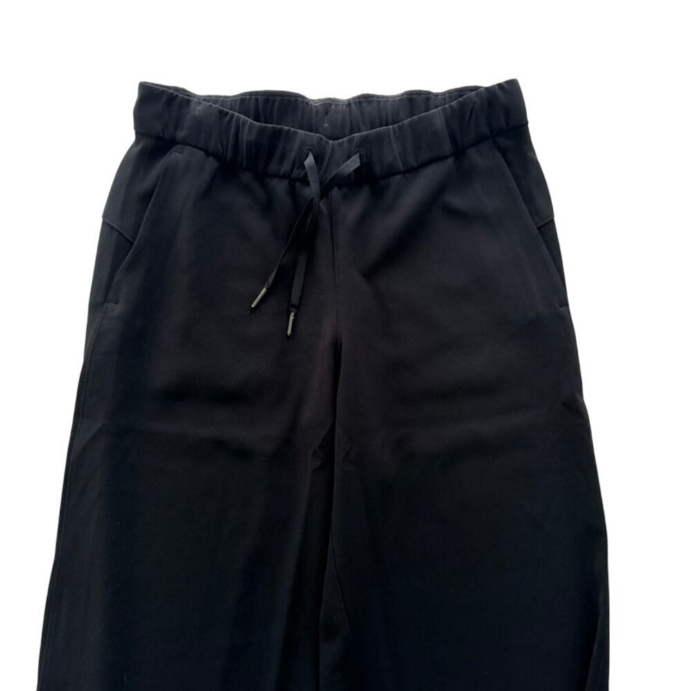Lululemon On The Fly Pant Wide Leg Woven 31" Black Size 8 Trouser Career Comfort - Picture 3 of 5